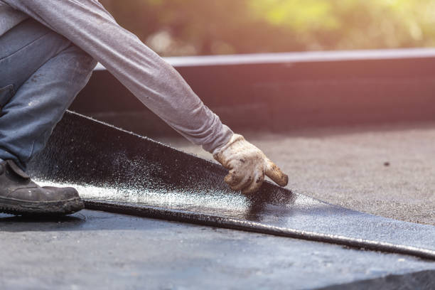 Professional Exterior Waterproofing technician working in Hutchinson, KS